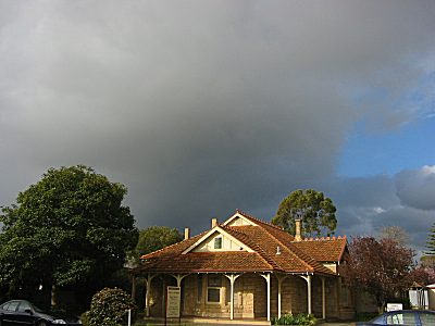 looming%20cloud%20crouching%20house.jpg