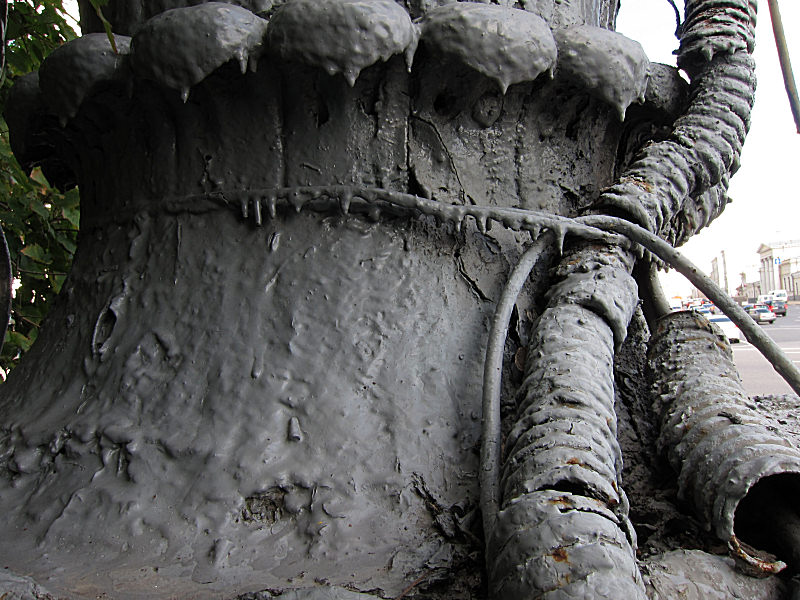 10_Many_coats_of_paint_on_the_base_of_a_street_light.jpg
