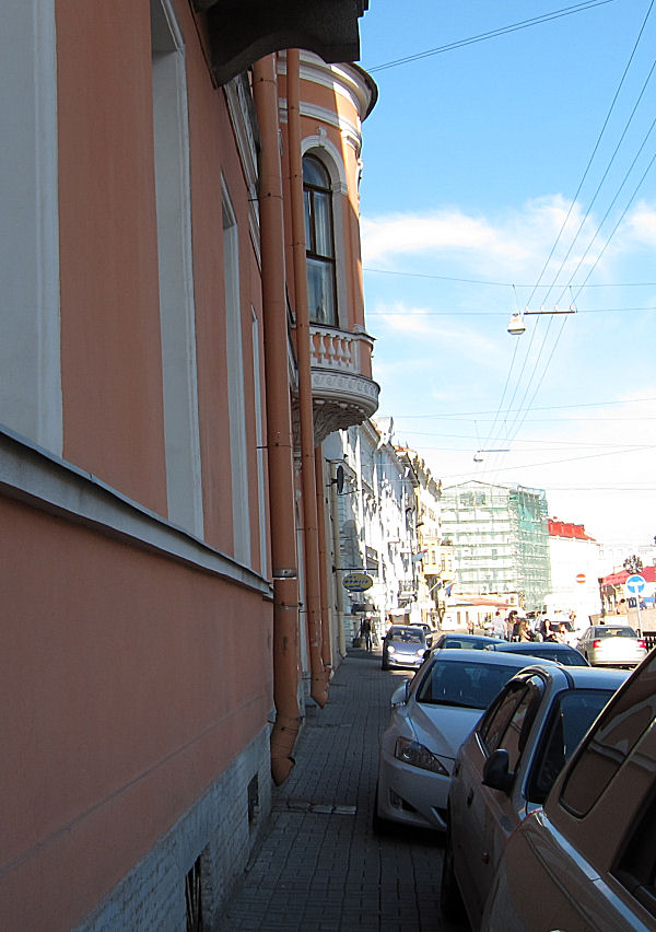 04_gutters_will_empty_across_the_car_covered_pavement.jpg